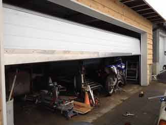 Two garage doors partially open